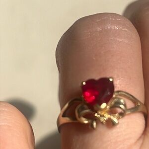 10k plumb gold, genuine ruby and diamond ring